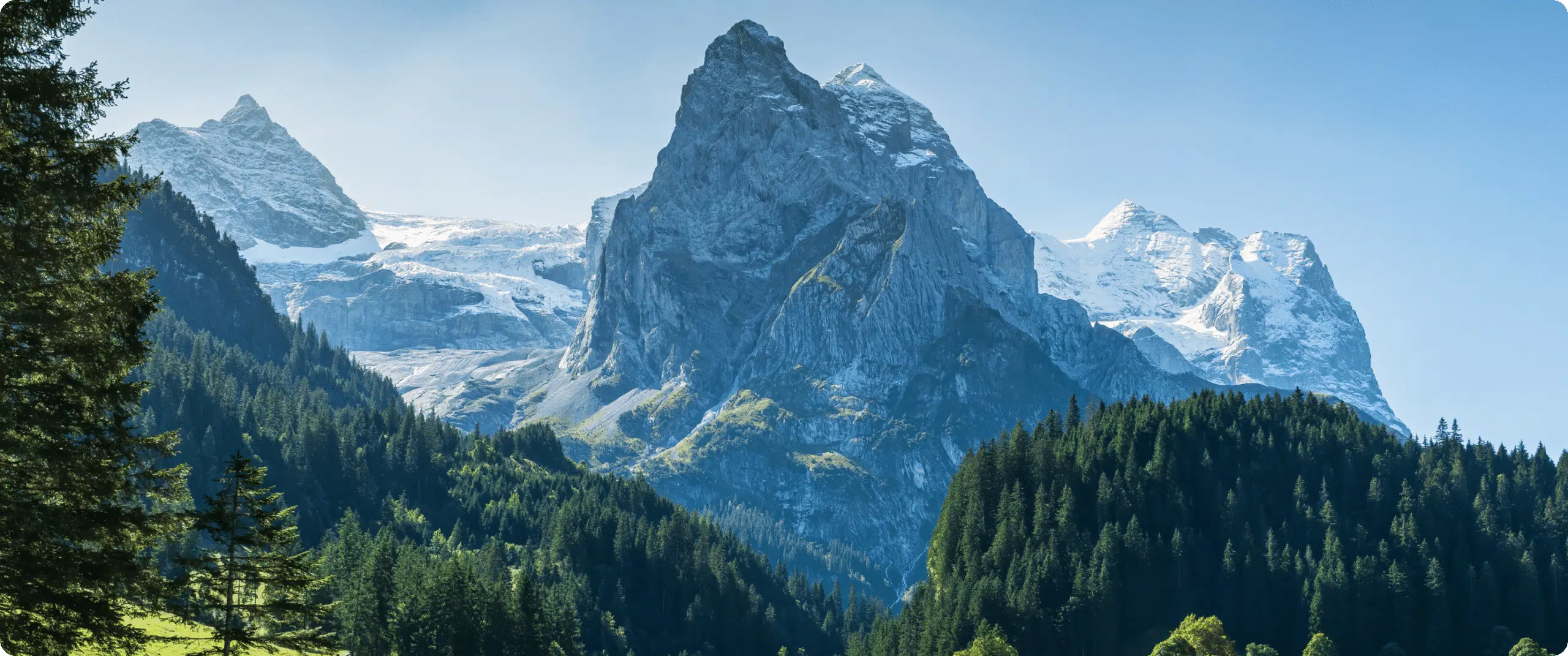view-of-rosenlaui-with-male-tourist-walking-along-2024-04-01-22-33-37-utc-1png